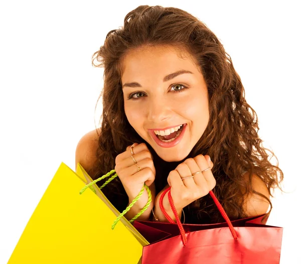 Mulher caucasiana jovem atraente com sacos de compras isolado ove — Fotografia de Stock