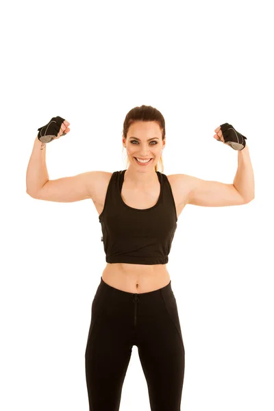 Beautiful sporty woman standing with crossed arms isolated over — Stock Photo, Image