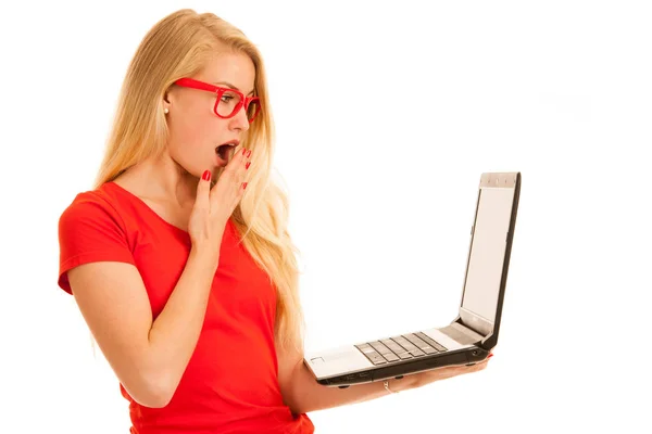 Beautiful young woman holds a laptop gesture surprise and succes — Stock Photo, Image