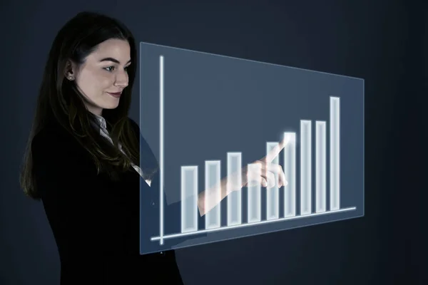 Attractive young business woman pressing virtual button over gra — Stock Photo, Image