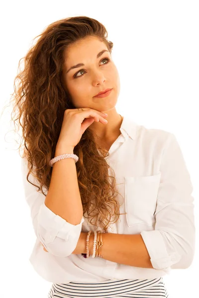 Attractive young pensive business woman smiling isolated over wh — Stock Photo, Image