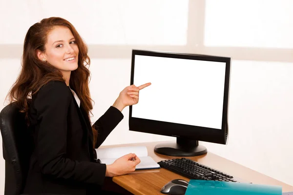 Baeutiful young business woman working at her desk in the office — Stock Photo, Image