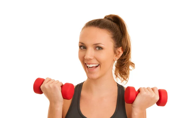 Beautiful young active fit woman workout with dumbbells isolated — Stock Photo, Image