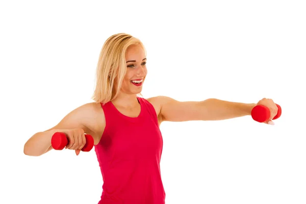 Active sporty woman works out with dumbbells isolated over white — Stock Photo, Image