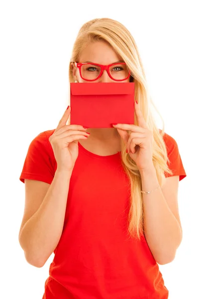 Beautiful young woman holds red envelope  - a love letter for va — Stock Photo, Image