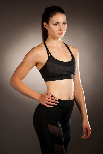 Active young fit woman with perfect body pose — Stock Photo, Image