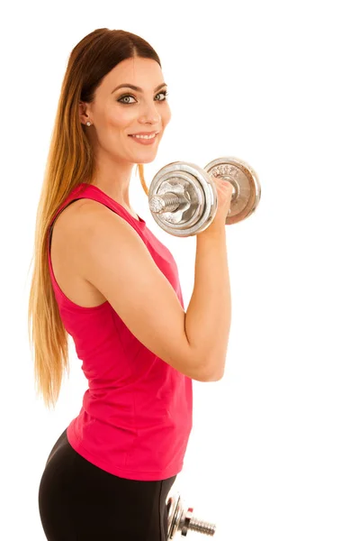 Beautiful young in pink t shirt  woman work out with dumbbells i — Stock Photo, Image