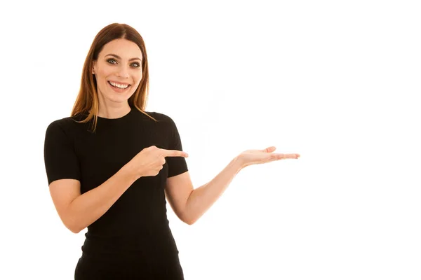 Confidens business woman points into copy space on her left isol — Stock Photo, Image