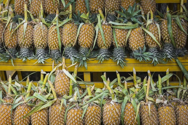 Fresh pineapple in local market in Kandy, Sri Lanka. Background. — Stock Photo, Image