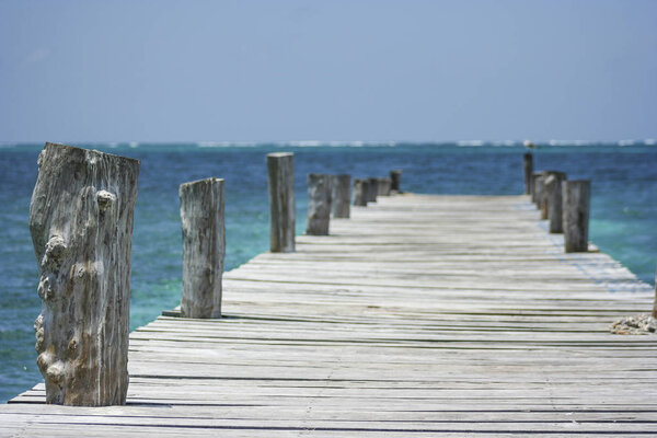 Wooden pier looking out the Mayan Riviera