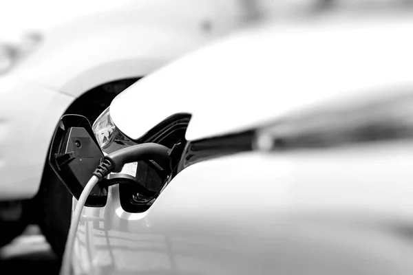 Cable hanging down from gas tank location on electrical vehicle. — Stock Photo, Image