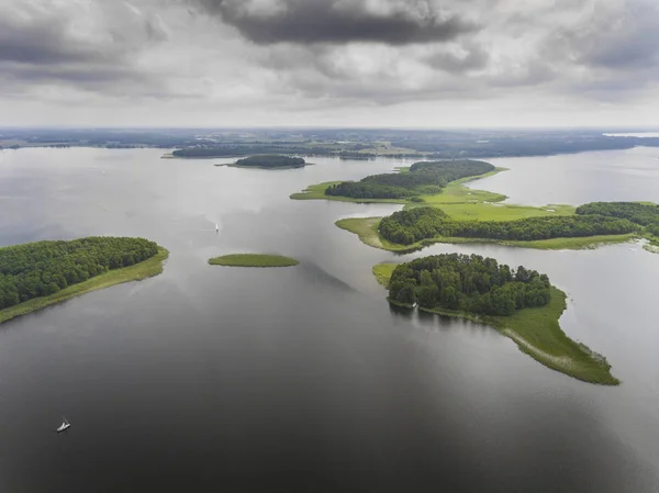 Aerial view of green islands and clouds at summer sunny morning. — Stock Photo, Image