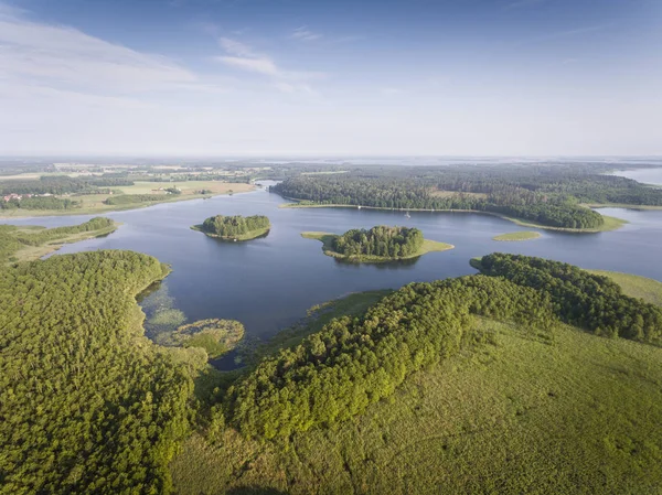 Aerial view of green islands and clouds at summer sunny morning. — Stock Photo, Image