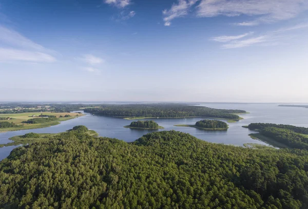 Aerial view of green islands and clouds at summer sunny morning. — Stock Photo, Image