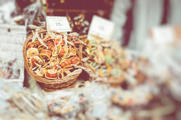 Christmas dry fruits decorations at a Christmas market — Stock Photo, Image