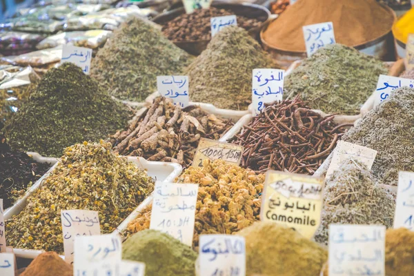 Selection of spices on a traditional Moroccan market (souk) in M — Stock Photo, Image