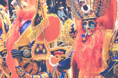 ORURO, BOLIVIA - FEBRUARY 10, 2018: Dancers at Oruro Carnival in clipart