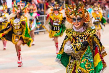 ORURO, BOLIVIA - FEBRUARY 10, 2018: Dancers at Oruro Carnival in clipart