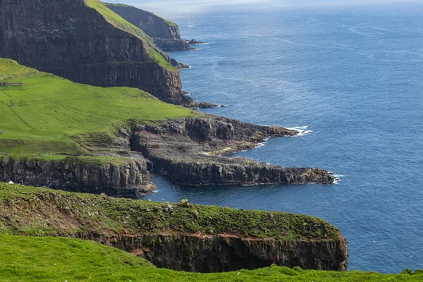 View on the Mykines island with moody clouds covering the top of — Stock Photo, Image