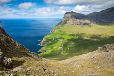 The Landscape near village of Gasadalur, Faroe Islands. Denmark.