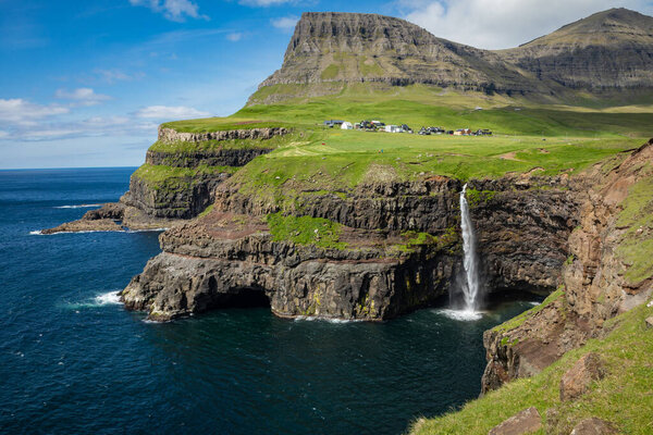 Mulafossur waterfall in Gasadalur village in Faroe Islands, Nort