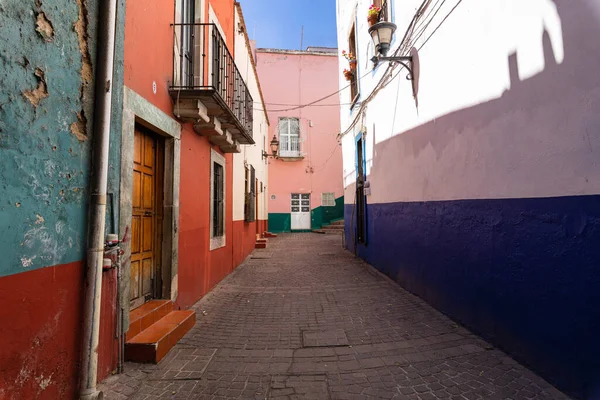 Colored colonial houses in old town of Guanajuato. Colorful alleys and narrow streets in Guanajuato city, Mexico. Spanish Colonial Style.