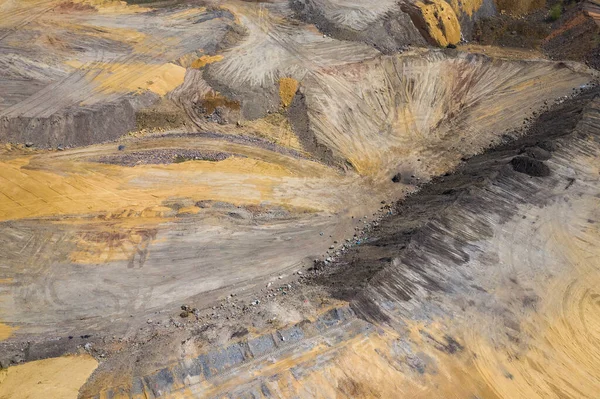 Aerial view of industrial mineral open pit mine. Opencast mining. Drone view from above.