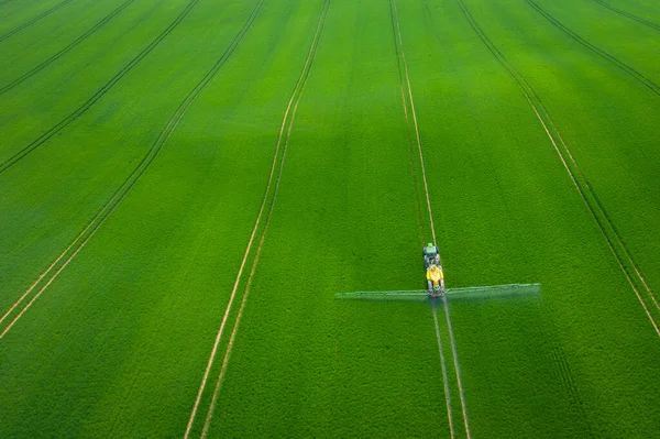 Green Fields Aerial View Tractor Spraying Chemicals Large Green Field — Stock Photo, Image