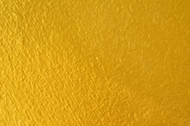 Altın arka plan eski duvar ve çizikler, doku ve gölge