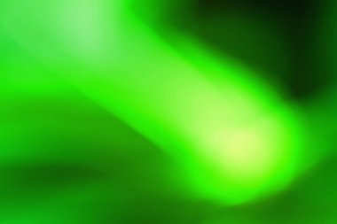 Nesne yüzeyindeki soyut yansıtıcı yeşil ışık.