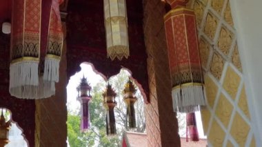 Lamphun, Thailand - Mar 7, 2020: Antique Lanna style lanterns displayed in Phra That Hariphunchai Temple.
