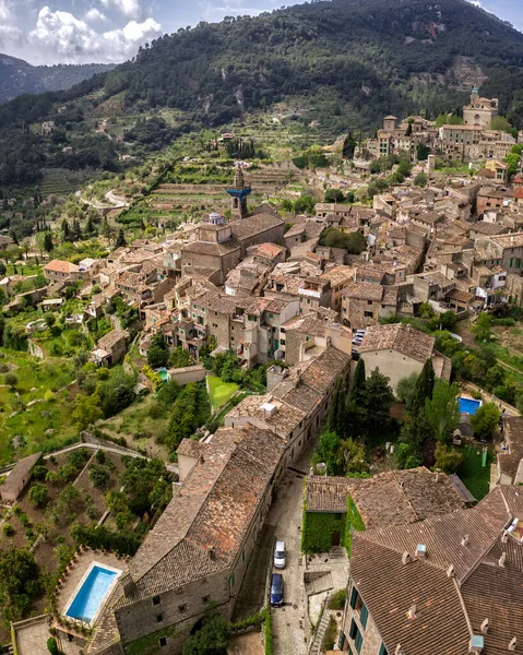 old european medieval village in mountains, valldemossa, mallorca, spain. Authentic architectural, vertical panorama