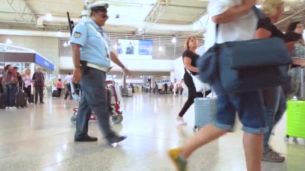 Athens, Greece - 30 september: airport inside people tourists go on an air flight — Stock Video