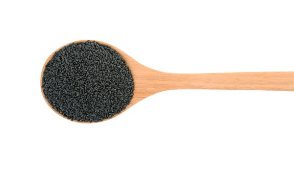 Top view of black sesame seeds in wooden spoon isolated on white — Stock Photo, Image