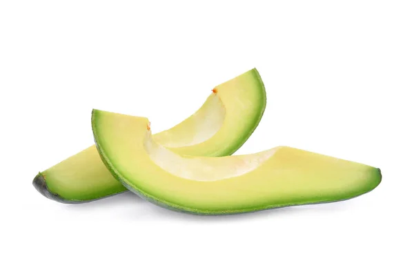 Due fette di avocado fresco isolate su fondo bianco — Foto Stock