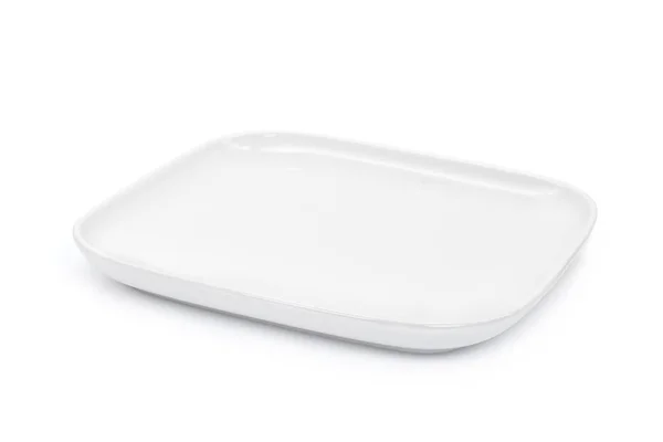 Пустая белая тарелка на белом фоне — стоковое фото