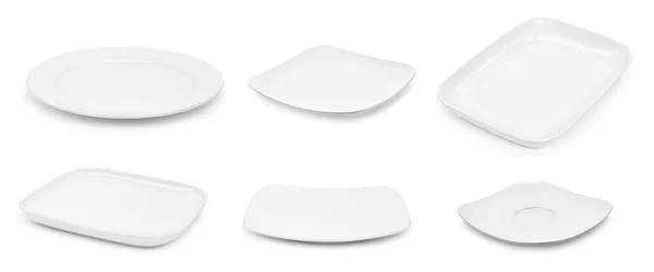 Set leerer weißer Teller isoliert auf weißem Hintergrund — Stockfoto