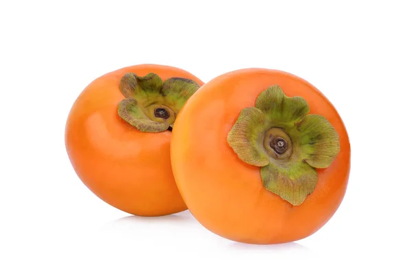 Two whole ripe persimmons isolated on white background — Stock Photo, Image