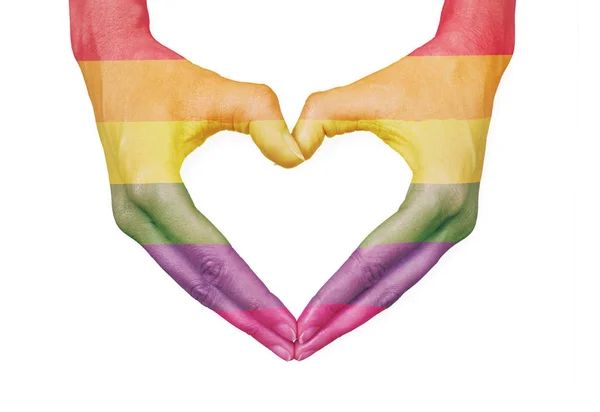 Форма серця з руками і прапор ЛГБТК+ Стокове Фото