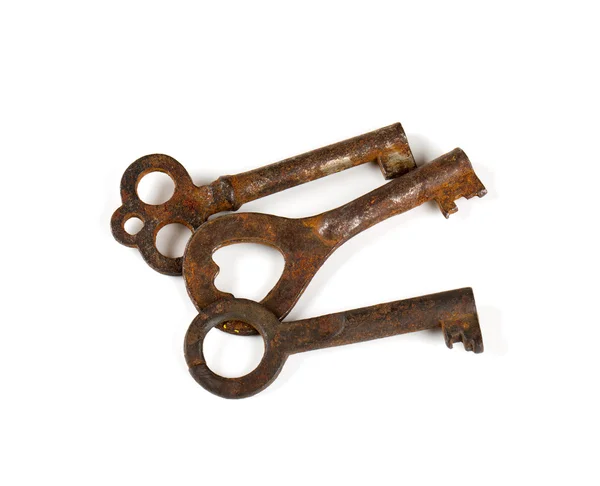 Vecchia chiave rustica su bianco — Foto Stock