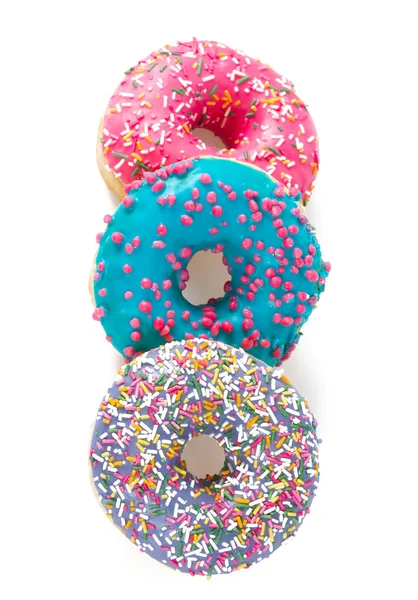 Bunte Donuts isoliert auf weiß — Stockfoto