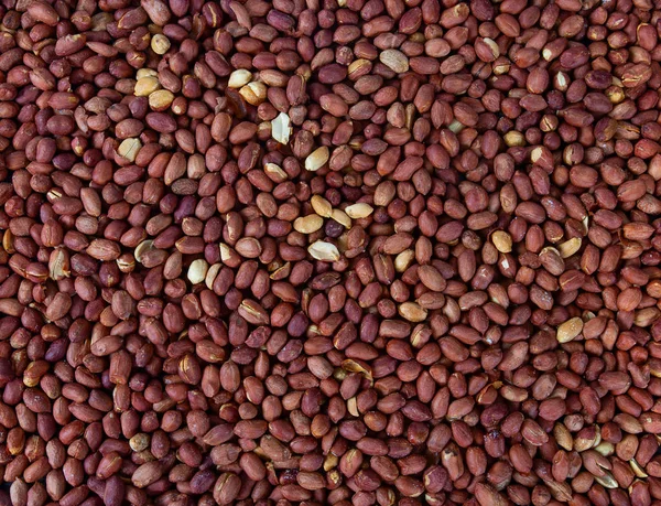 Свежеобжаренный соленый арахис фон — стоковое фото