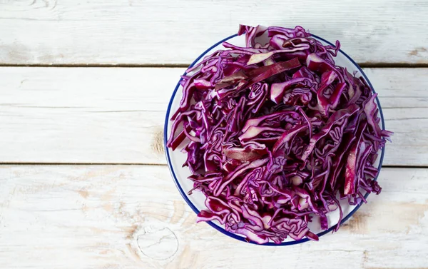 Red cabbage on white wooden surface — Stock Photo, Image