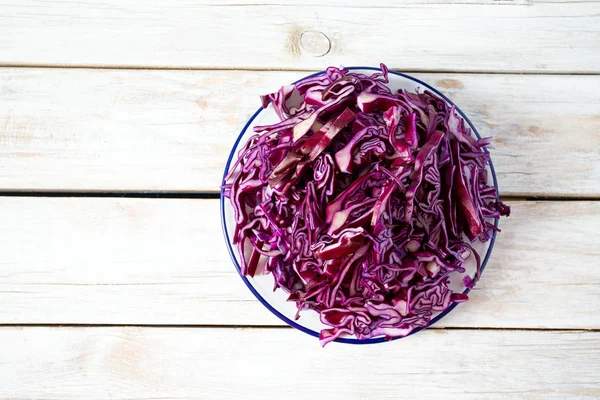 Red cabbage on white wooden surface — Stock Photo, Image