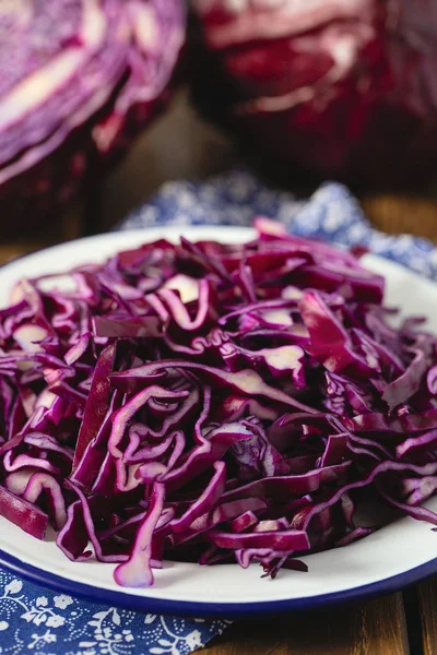 Red cabbage on brown wooden surface — Stock Photo, Image