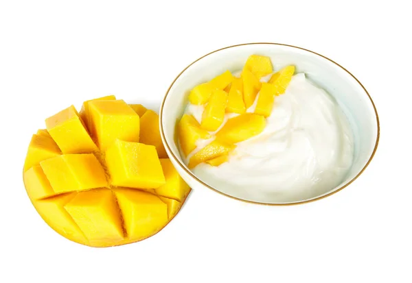 mango and yogurt in a bowl