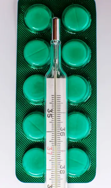Thermometer Measuring Body Temperature Many Different Pills Treating Disease — ストック写真