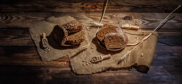 Fragrant Fresh Tasty Black Bread Spikelets Grains Vintage Surface — Stock Photo, Image