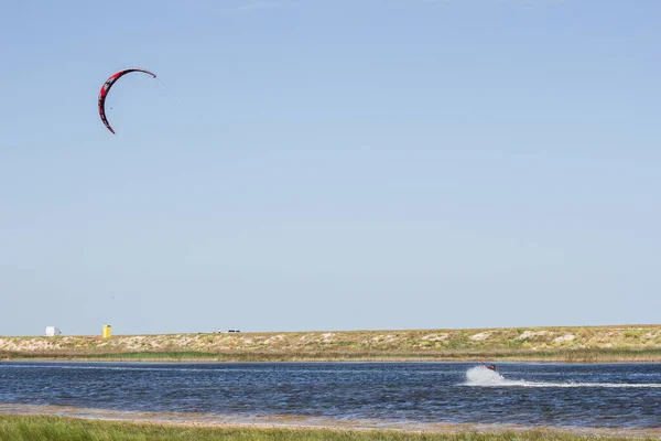 Athlete Rides Kitesurfing Sea Hot Summer Jumps Tricks — Stock Photo, Image