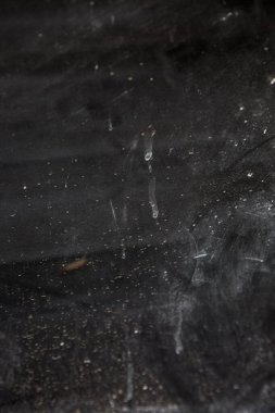 Doku ve tasarım için siyah camdaki beyaz noktalar